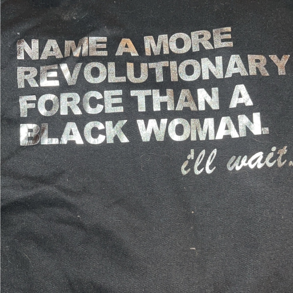 Revolutionary black woman hoodie. Normal wear and tear in high traffic areas